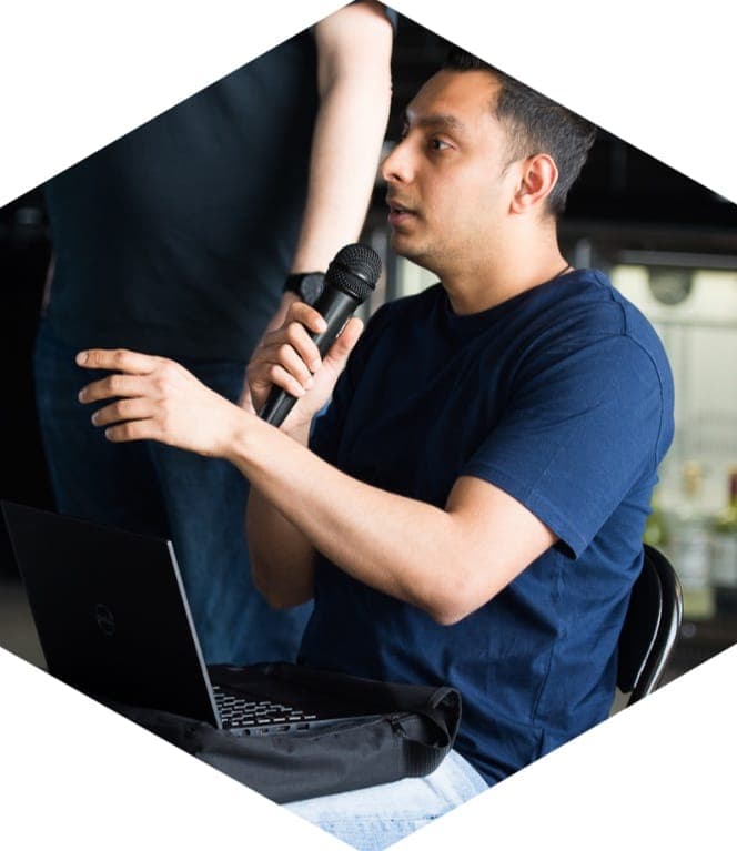 A participant asking a question during a 25eight session