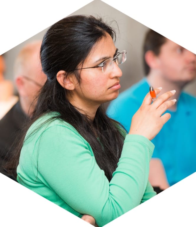 An owner deep in thought during a workshop